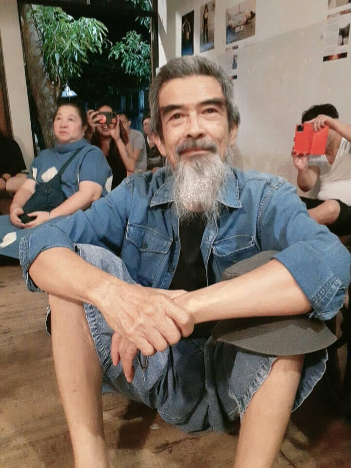 Photo of Chumpon, taken during the performance. His eyes are big and warm and his beard seems to sparkle.